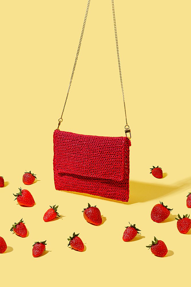 Colourful product stills photography of handbags for GVG accessories. Styled content creation photography by Marianne Taylor.