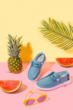 Fun colourful product photography for Hey Dude Shoes. Styled product stills photography by Marianne Taylor.