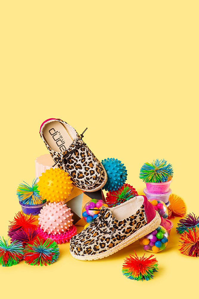 Fun colourful product photography for Hey Dude Shoes. Styled product stills photography by Marianne Taylor.