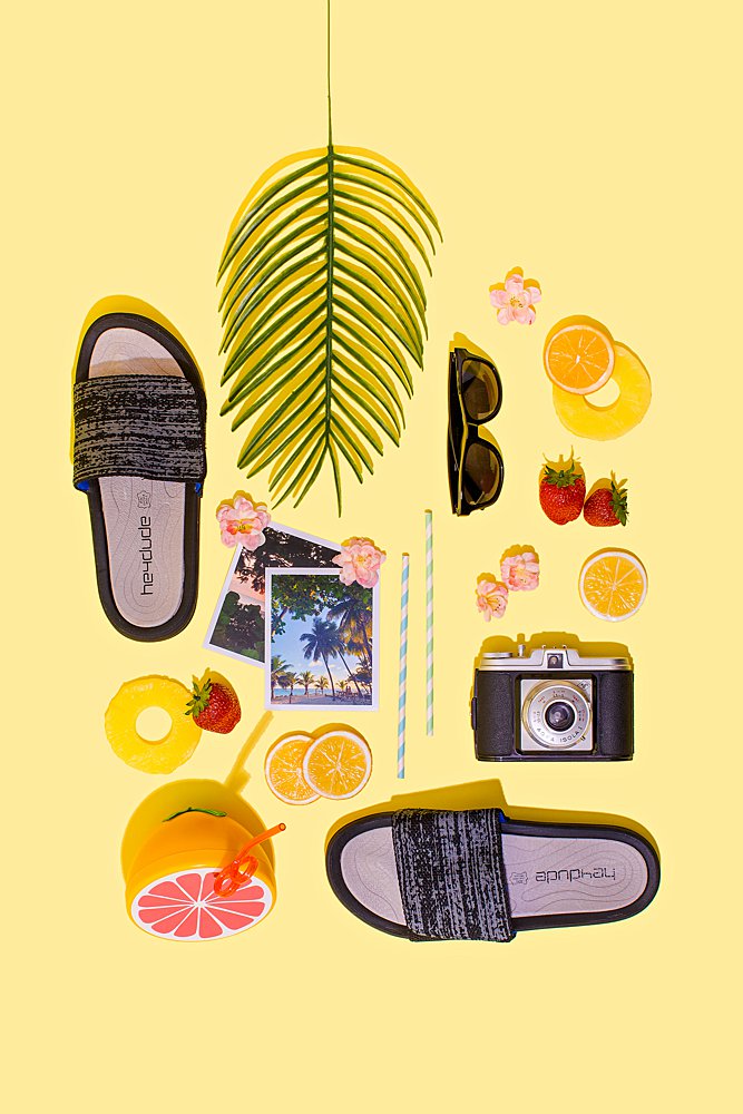 Fun colourful product photography for Hey Dude Shoes. Styled product stills photography by Marianne Taylor.