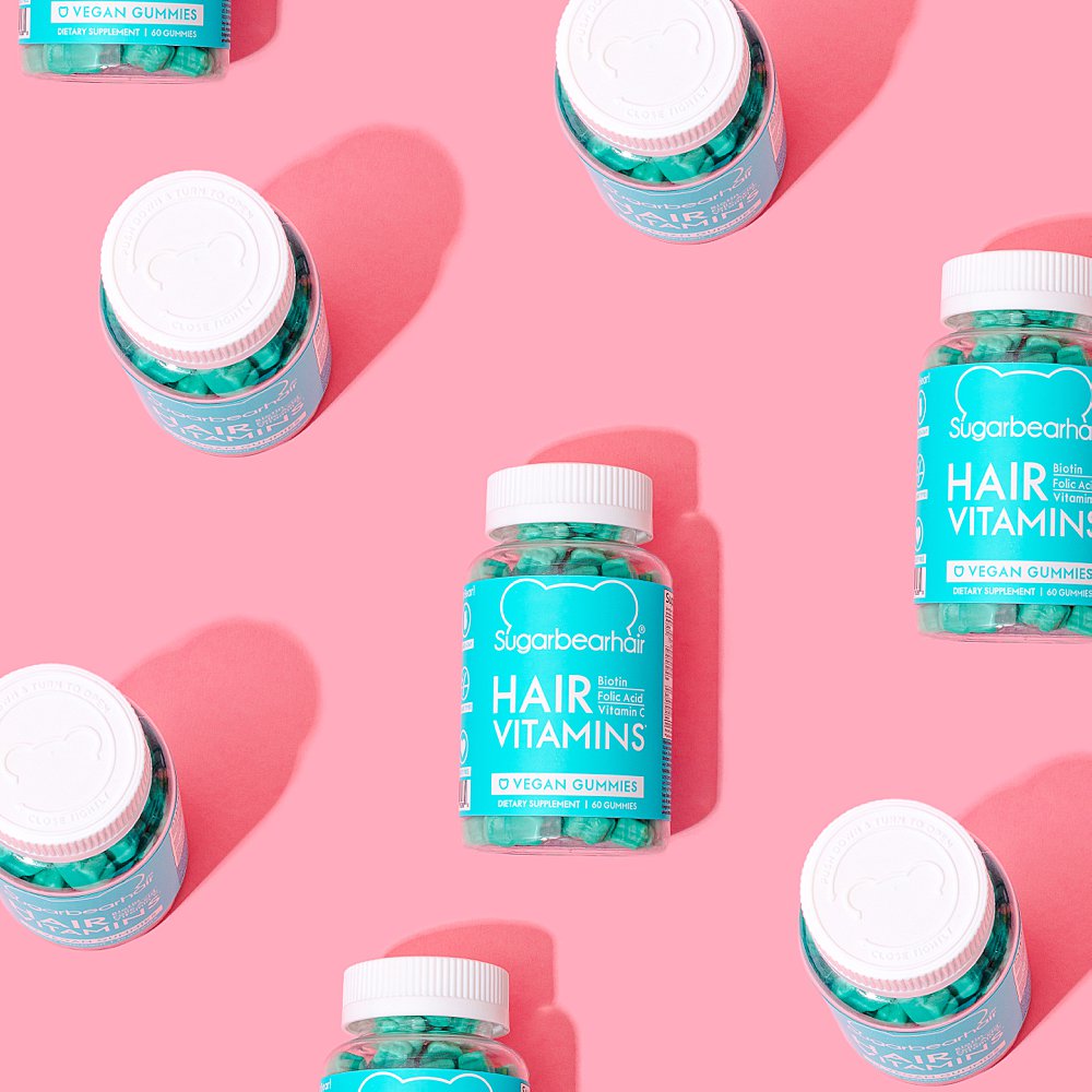 Beauty stills content creation for SugarBearHair hair and sleep vitamins in in pink and blue. Styled health product stills photography by Marianne Taylor.