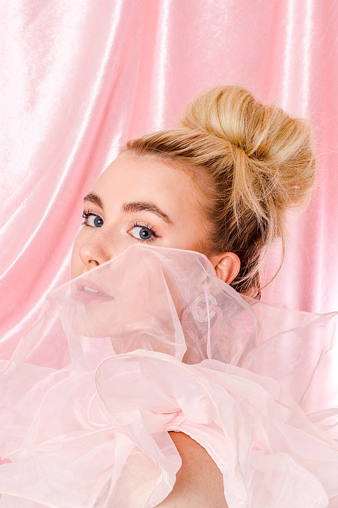 Pink creative beauty shoot with bubbles. Styled editorial photography by Marianne Taylor.