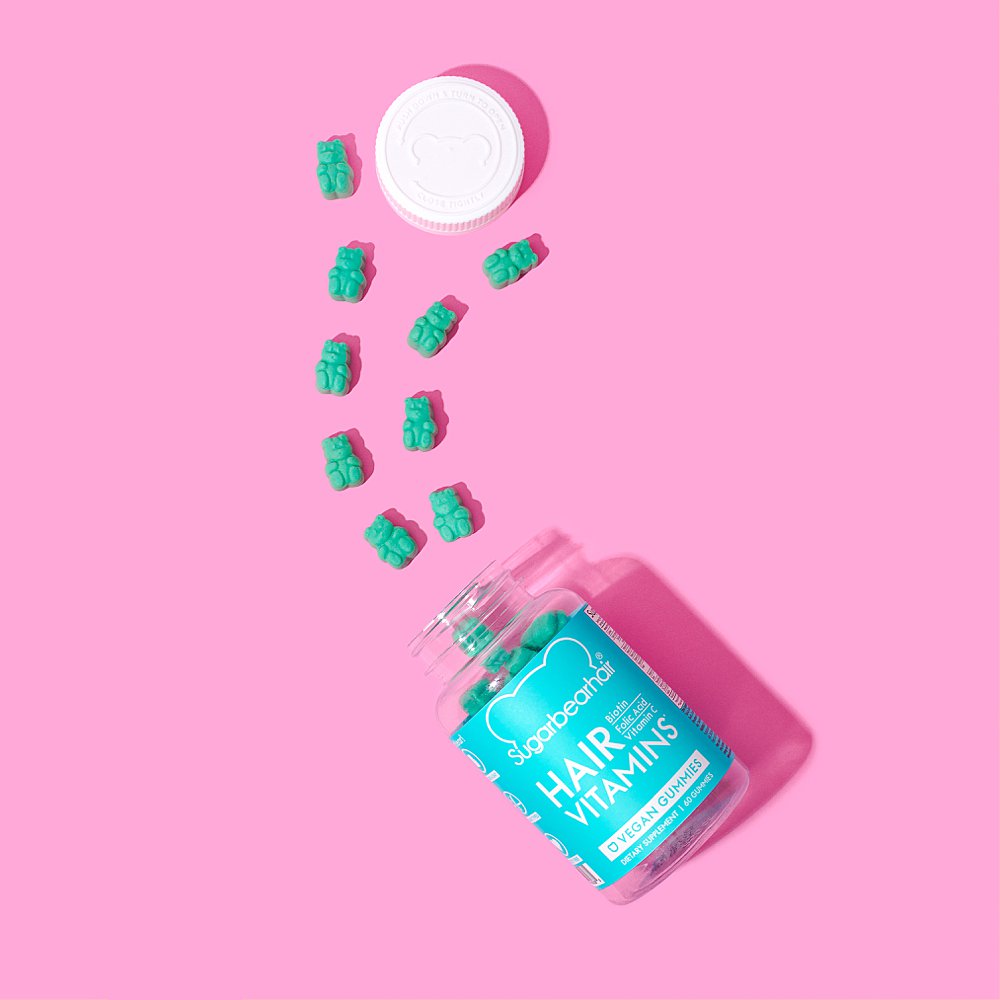 Colourful stills content creation for SugarBearHair hair and sleep vitamins in in pink and blue. Styled health product stills photography by Marianne Taylor.