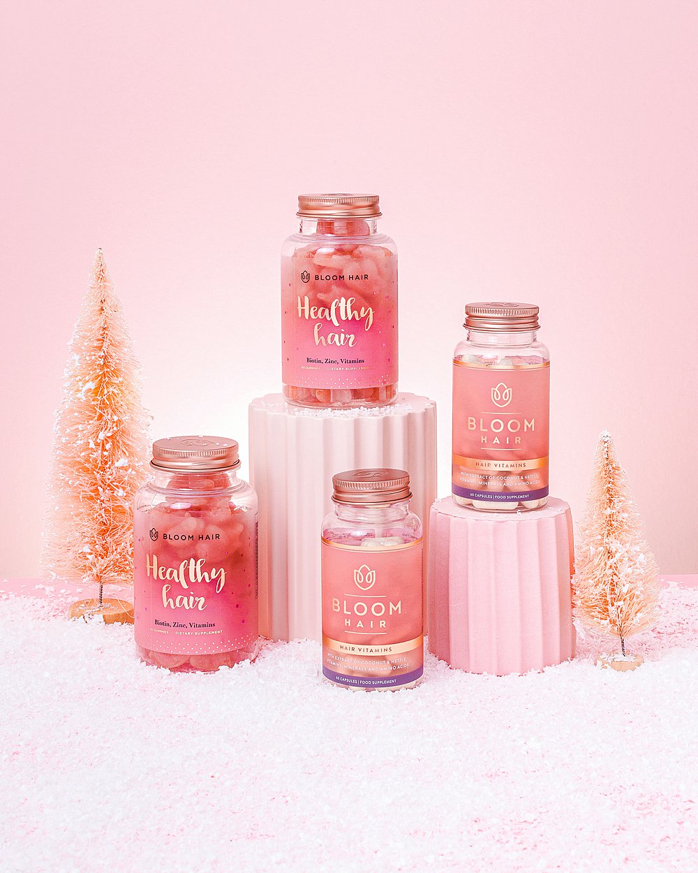 Pink stills Christmas content creation for Bloom Hair vitamins. Styled health product stills photography by Marianne Taylor.
