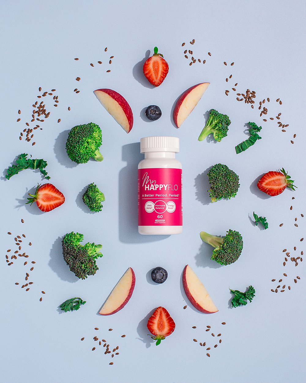 Colourful fun stills content creation for My Happy Flo period vitamins. Styled womens health product stills photography by HIYA MARIANNE.