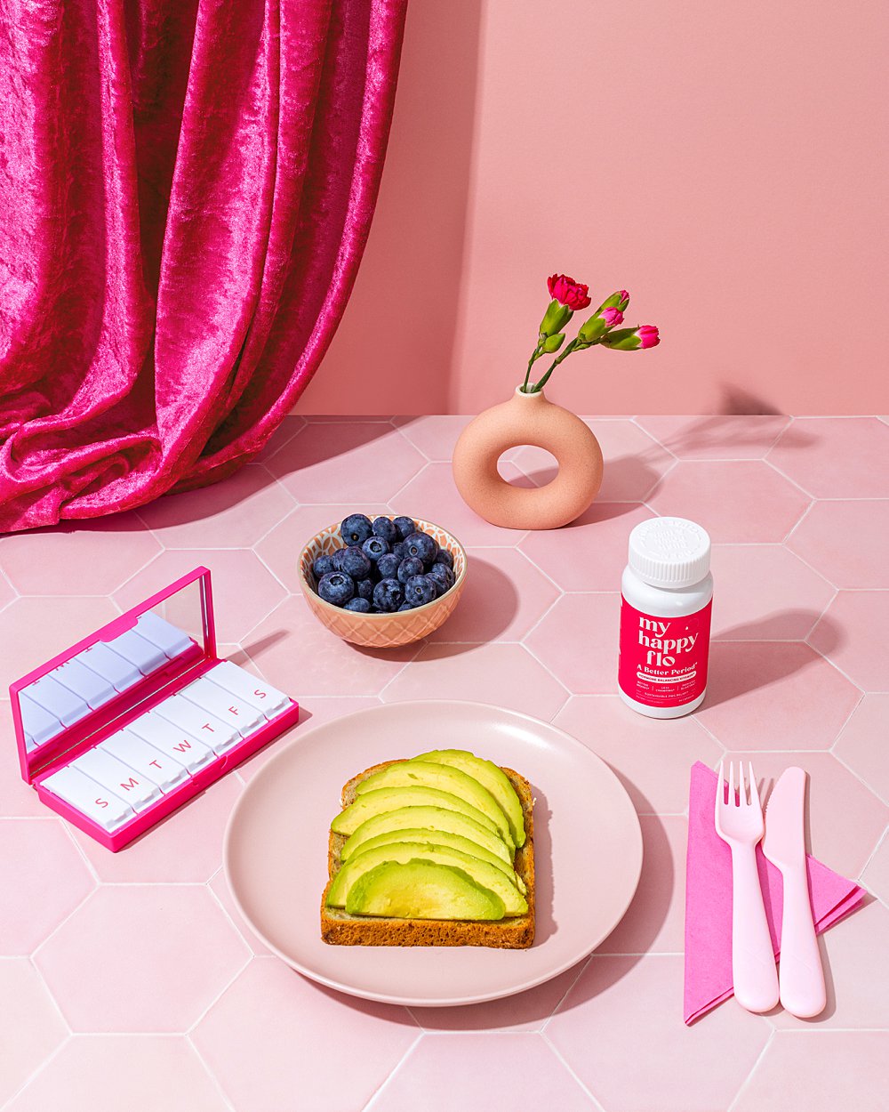 Colourful content creation for My Happy Flo female health supplements. Styled product still life photography by HIYA MARIANNE content studio.