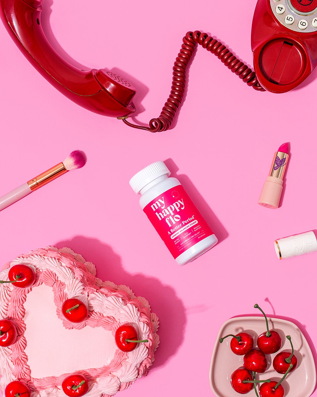 Colourful content creation for My Happy Flo. Styled female health supplement product still life photography by HIYA MARIANNE photo production studio.