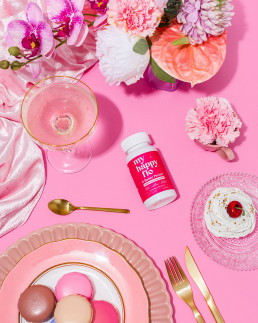 Colourful content creation for My Happy Flo. Styled female health supplement product still life photography by HIYA MARIANNE photo production studio.