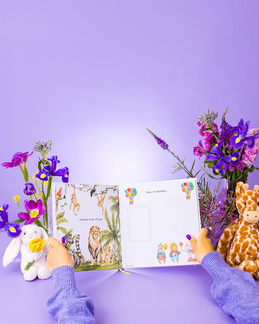 Colourful product photography for Bali Vaughn Story of Us baby book with floral styling. Floral styling and still life photography by HIYA MARIANNE photo production studio.