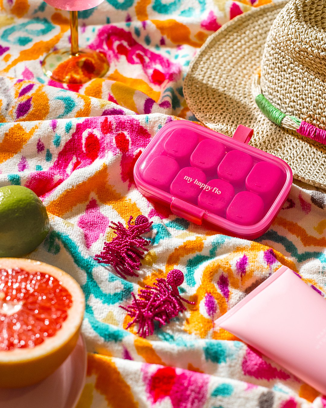 Colourful product photography for My Happy Flo period supplements. Styling and still life photography by HIYA MARIANNE photo production studio.