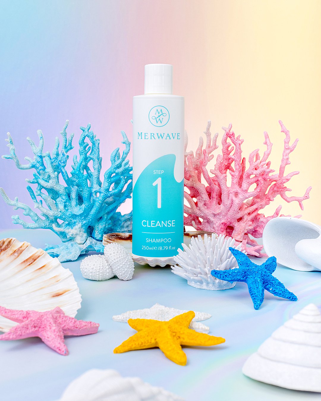 Colourful undersea product photography for Merwave wavy hair haircare products. Mermaid styling and still life photography by HIYA MARIANNE photo production studio.