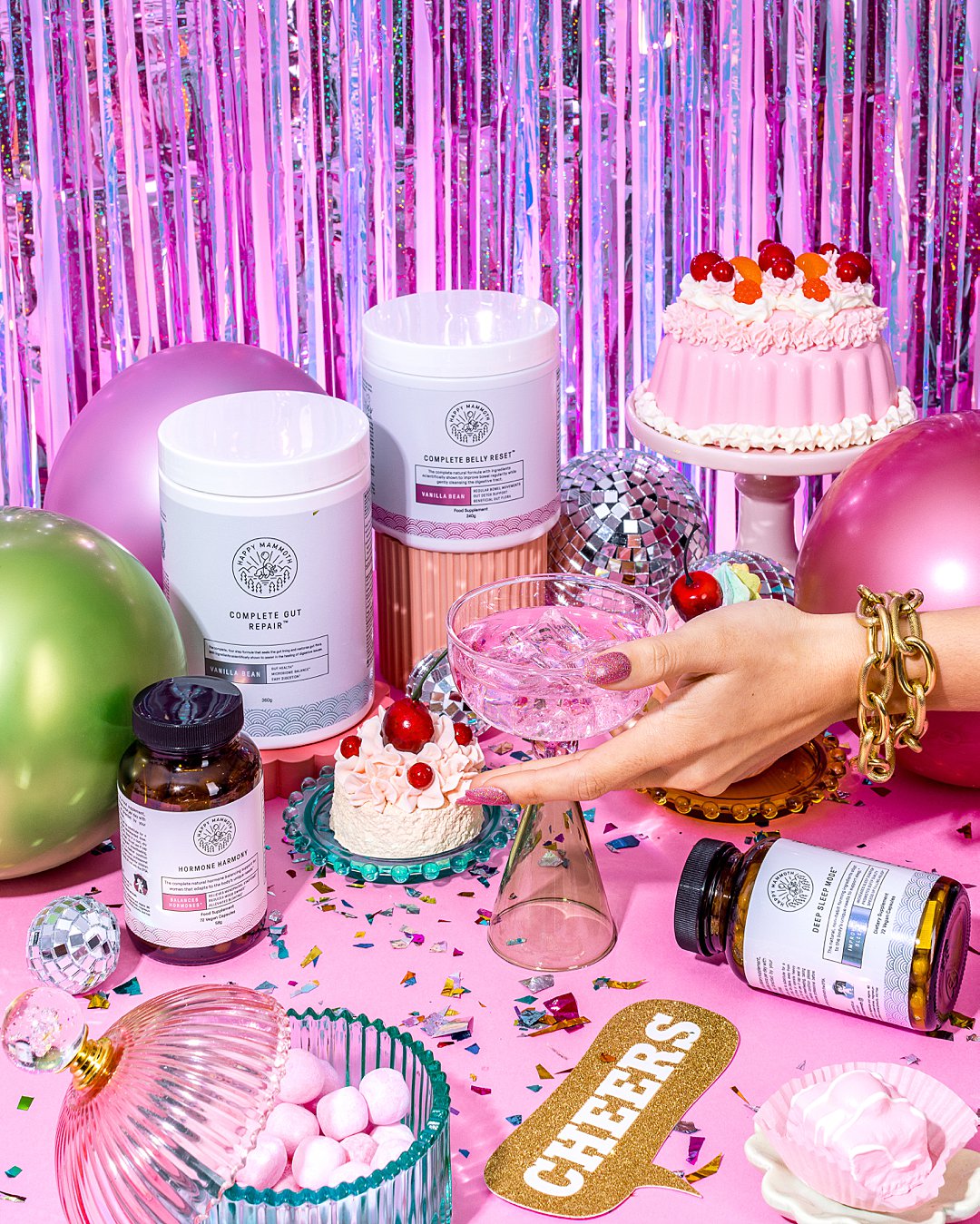 Colourful New Years Eve product photography for Happy Mammoth vitamin supplements. Styling and still life photography by HIYA MARIANNE photo production studio.