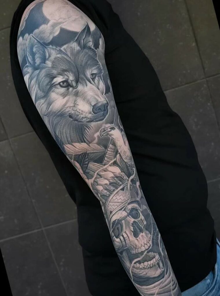 fine line black & grey tattoo arm sleeve wolf native