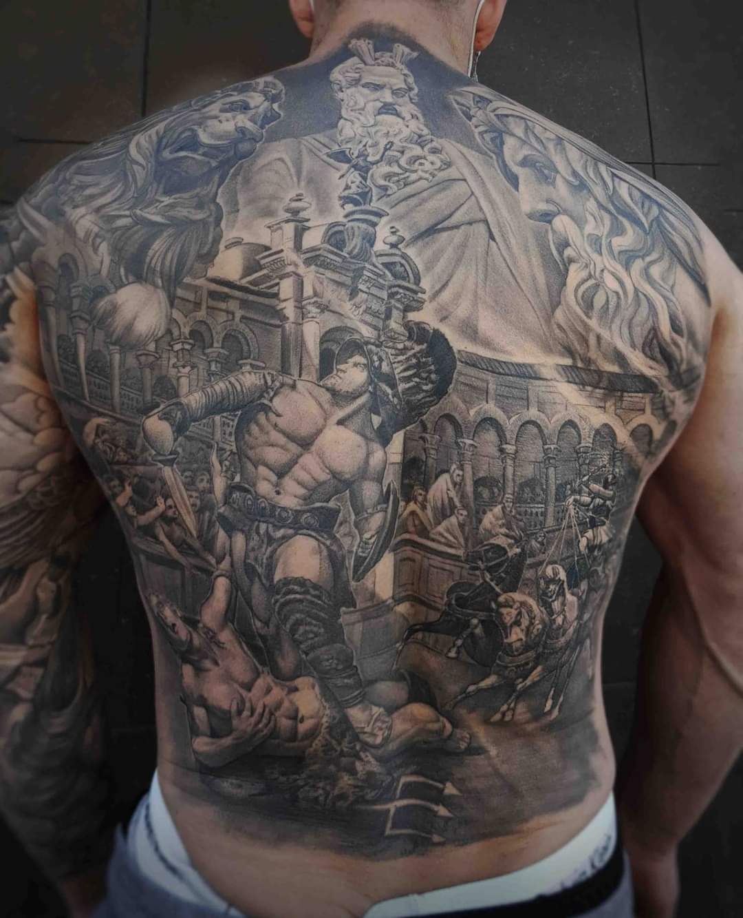 Griekse goden gladiator colosseum black and grey tattoo back piece