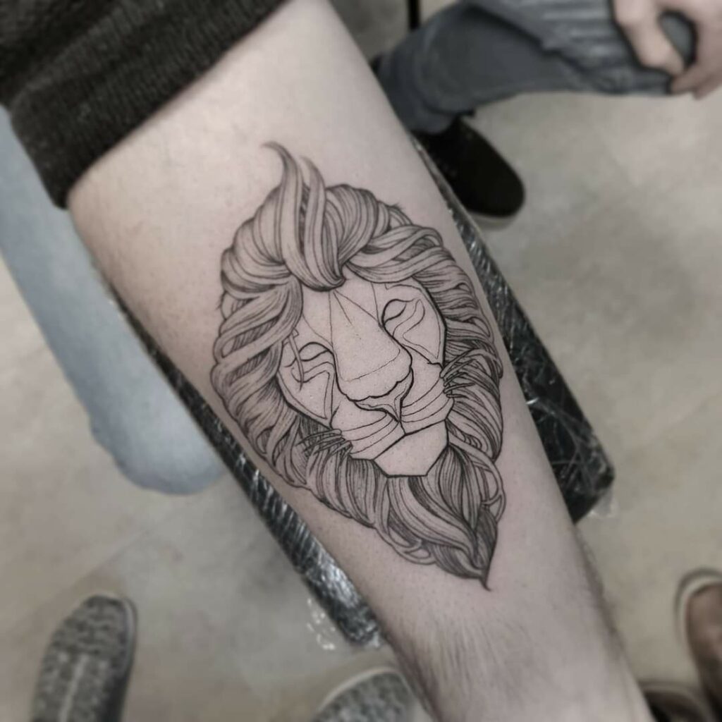 Line work lion tattoo