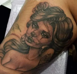 single needle black and grey clown girl head tattoo