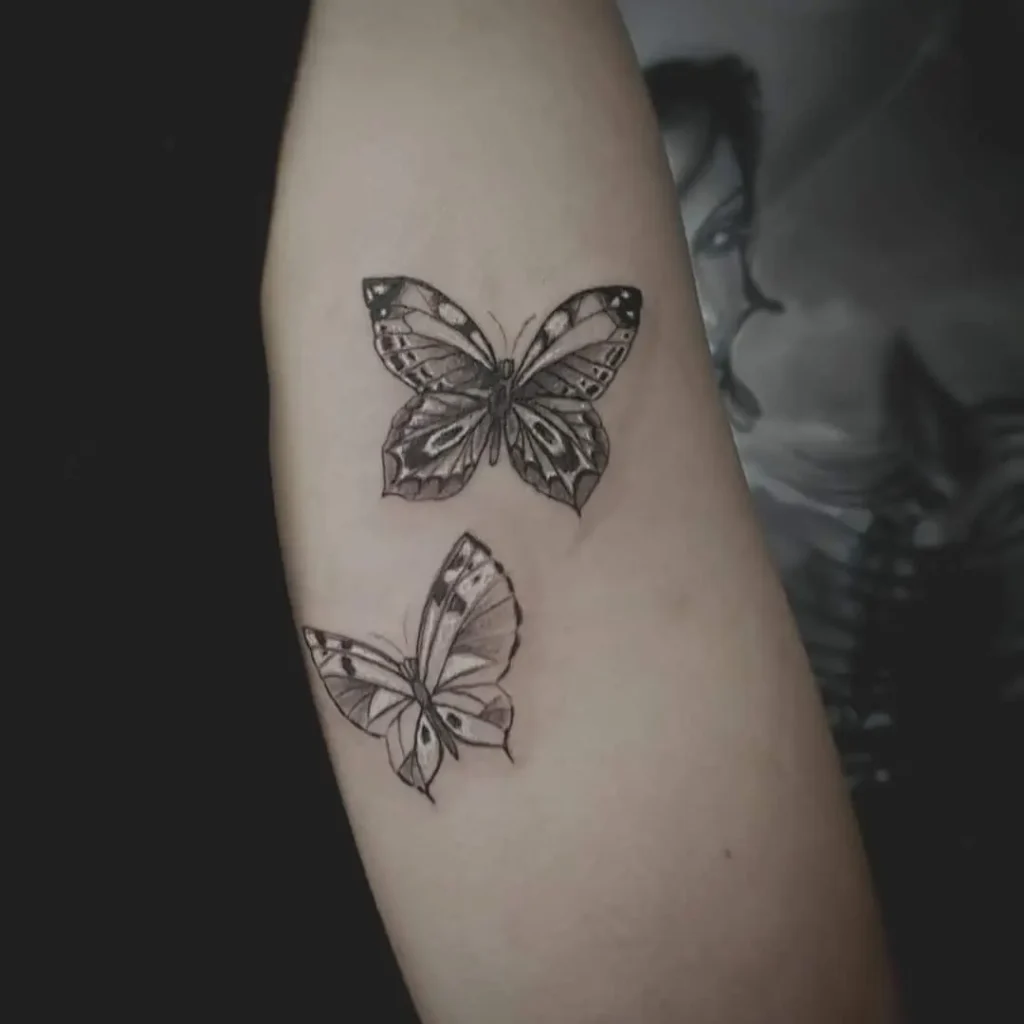 vlinder tattoos achter op arm