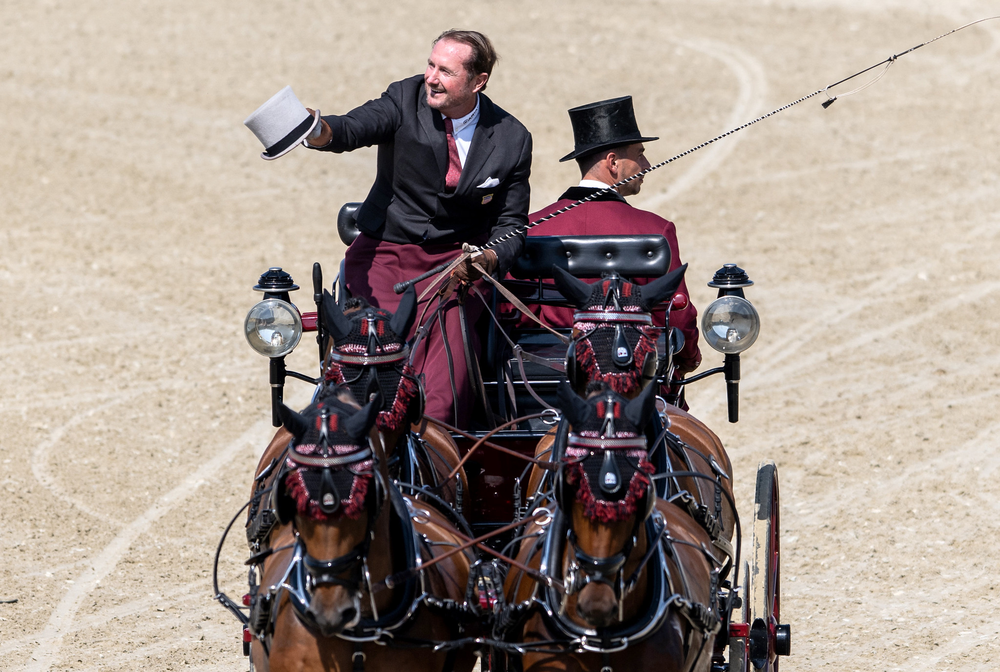 CHESTER WEBER aus den Vereinigten Staaten reagiert, nachdem er mit seinen Pferden - FIRST EDITION, JULIUS V, KADORA und KASPER D - an einer Dressurprüfung während der FEI-Weltmeisterschaft im Vierspännerfahren in Szilvásvárad, Ungarn, am 6. September 2024 teilgenommen hat Copyright © FEI/Martin Dokoupil