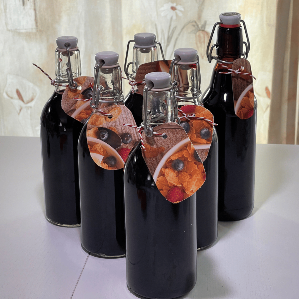 Bottles of concentrated Aronia berry juice ready for storage
