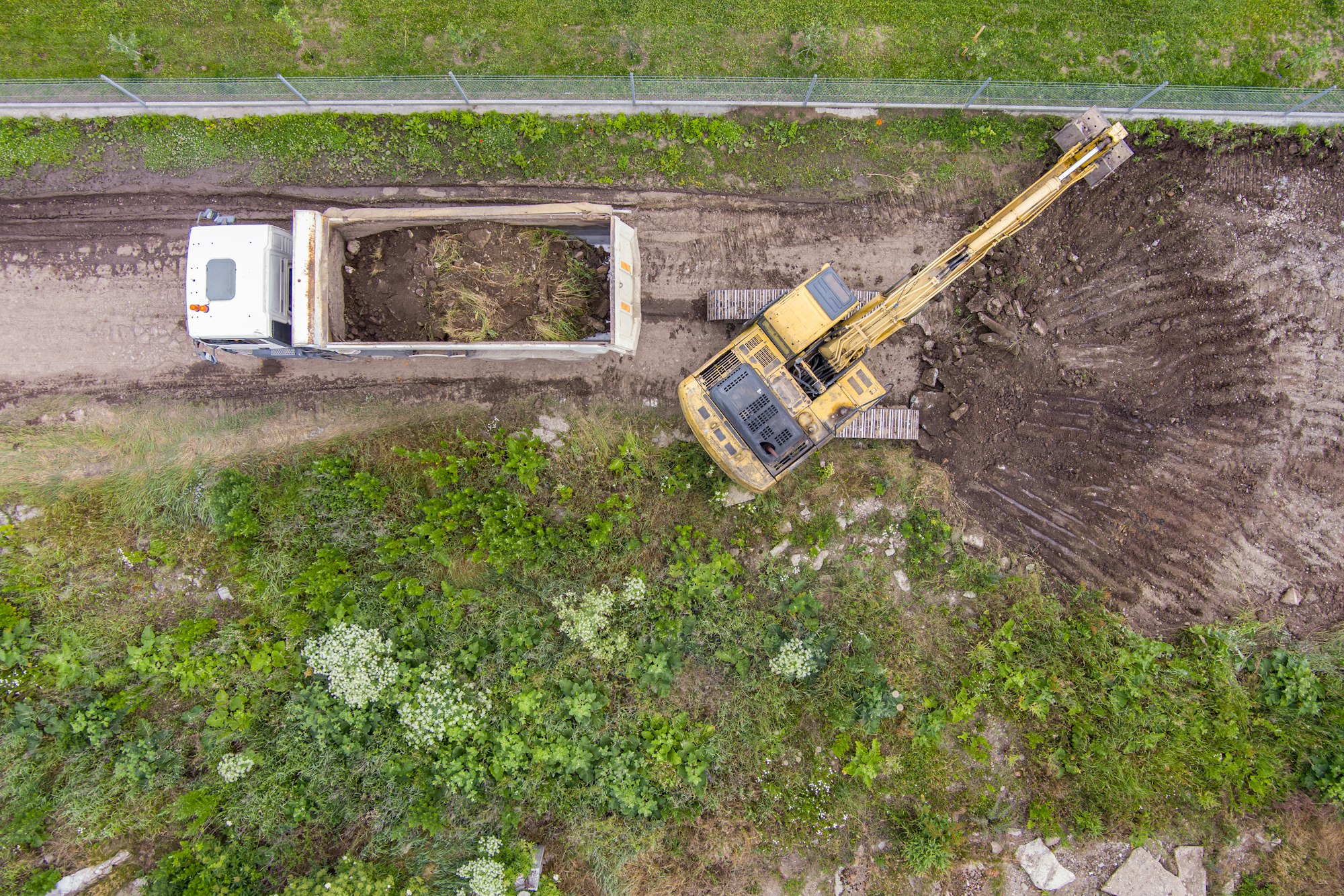 Excavator working removing earth