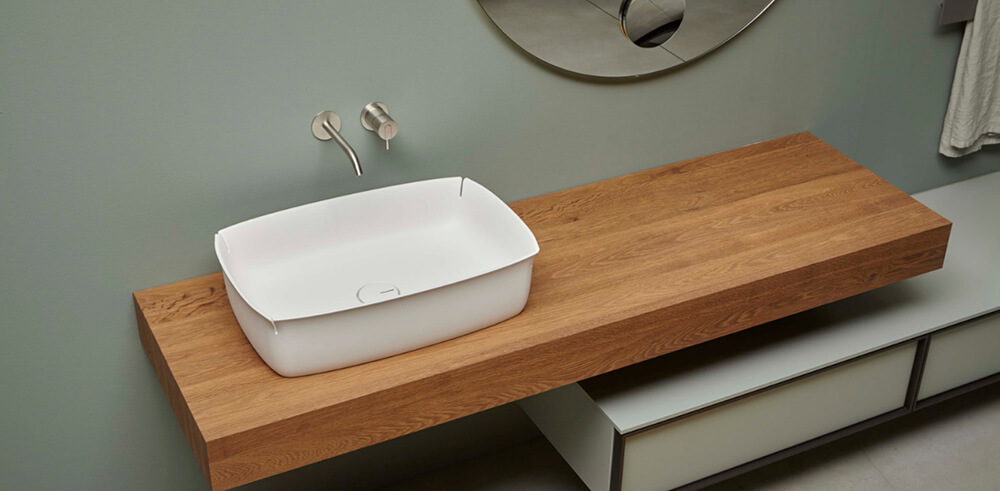 Bloom de Antonio Lupi, el lavabo con cuatro suaves fisuras fabricado con flumood