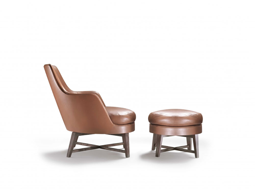 Guscio poltrona con pouf Flexform