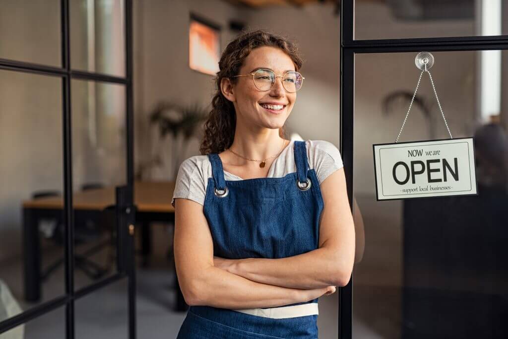 Entrepreneur in front of newly opened store