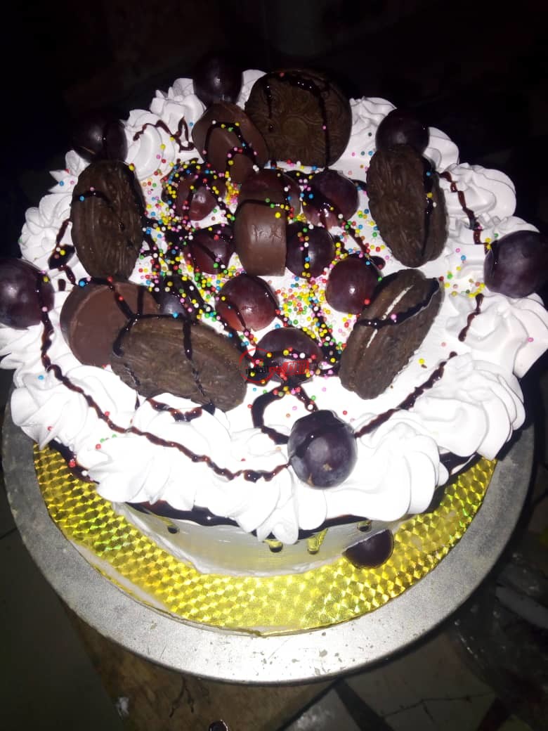 8" Chocolate with whipped cream cake