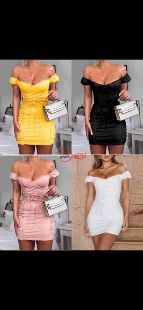 Sylivia Quality Gowns with a nice purse