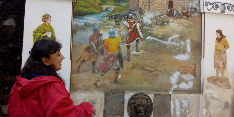Introbio – Manuela Sabatini restaura il dipinto sotto la torre