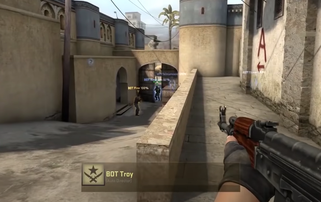 A Counter Strike: Global Offensive bot about to shoot another bot.