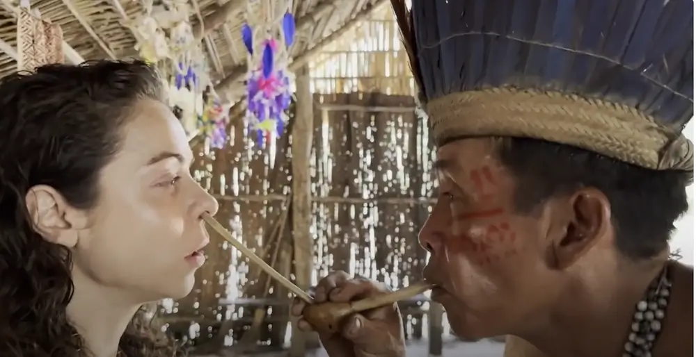 participant receive rapa before Ayahuasca in the Amazon