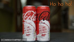 Two cans of Coca-Cola