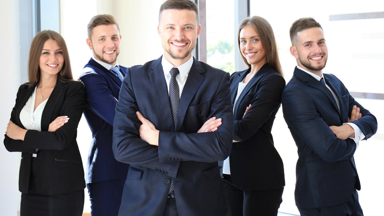 Portrait of happy business partners looking at camera