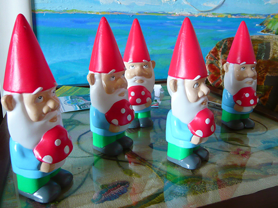 plastic knomes holding toadstools