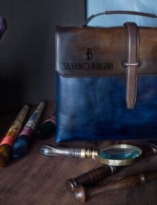 Silvano Biagini Leather bage and tooles on a wooden bench