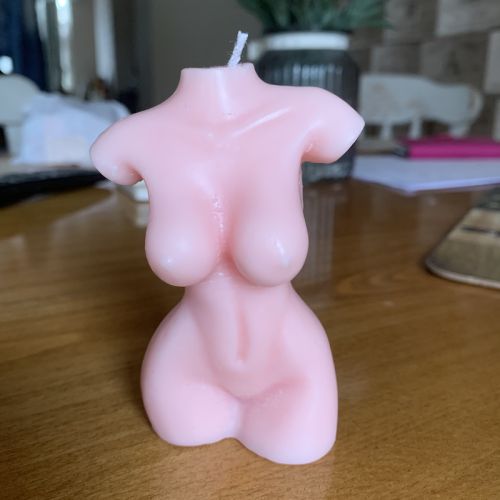 Female torso in pink closeup