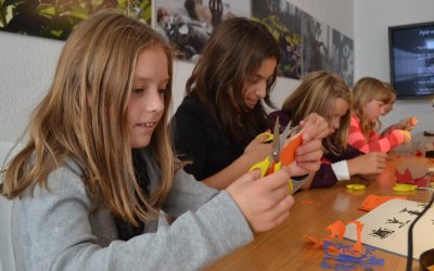 250 Odense school students in a paper cut workshop