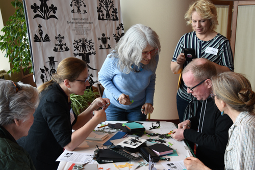 Participants at Danish Paper Cut Artist Torben Jarlstrøm Clausen's workshop at University of Wisconsin-Madison