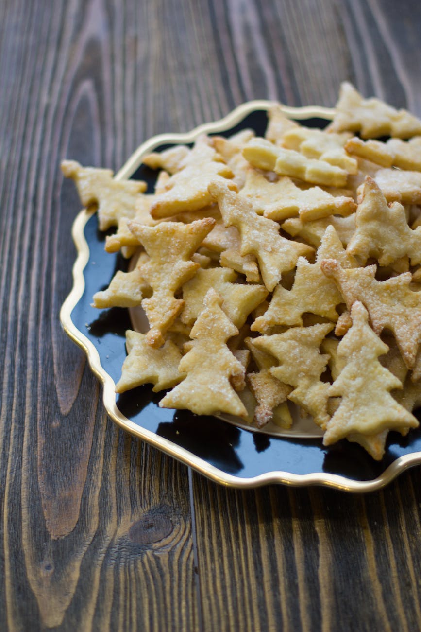 christmas tree shaped biscuits on plate