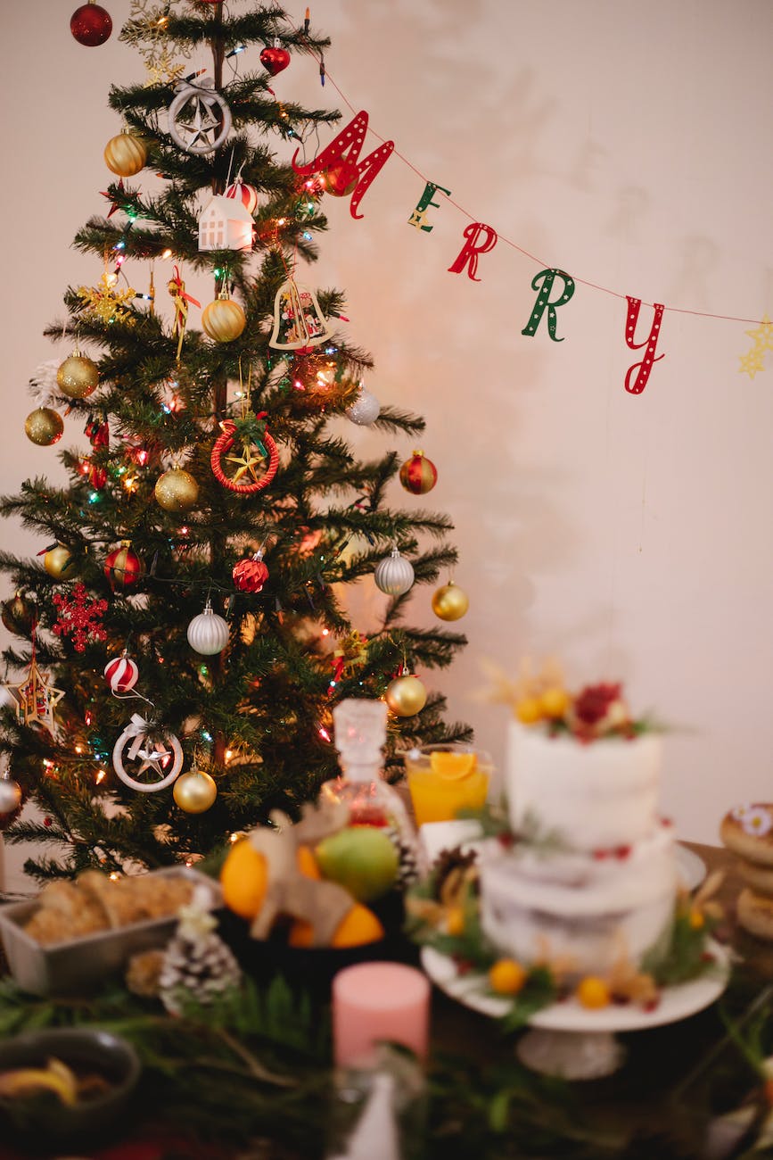 decorated christmas tree with baubles at home
