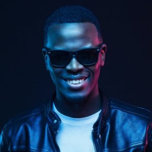 studio-portrait-of-smiling-african-american-male-model-wearing-trendy-sunglasses-and-leather-jacket-e1655156746850.jpg