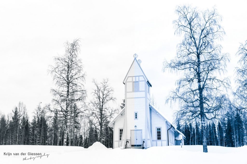 White church in white snow