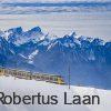 The Rochers de Naye cog railway and the mountains over Lake Geneva