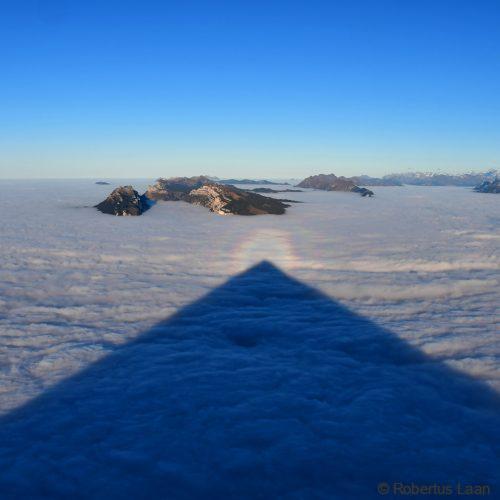 The perfect pyramid shape over the low clouds seen from the Niesen summit,