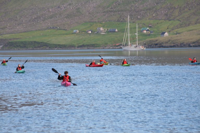 kayaks and sailboat