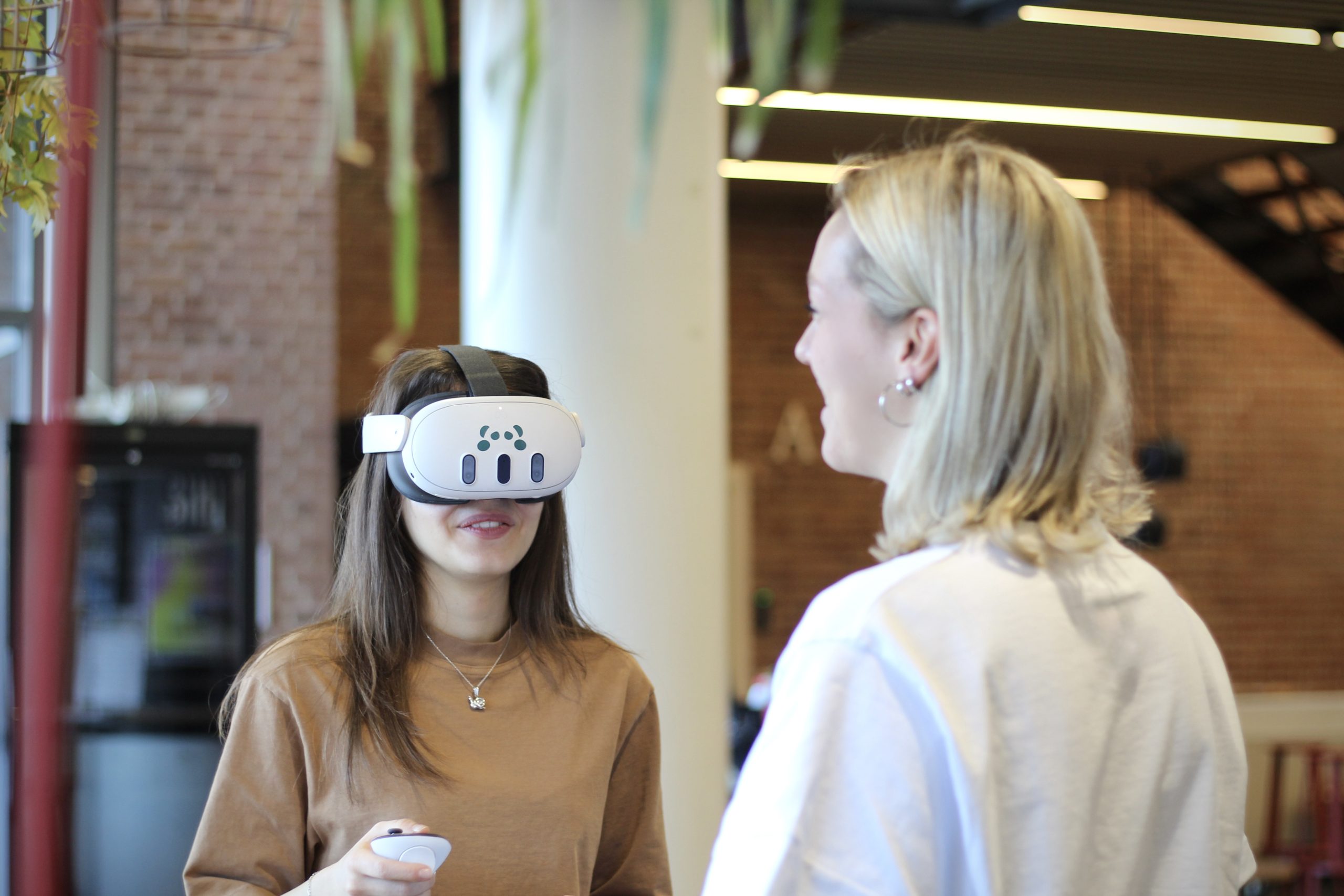 Two students using Kanda VR simulators