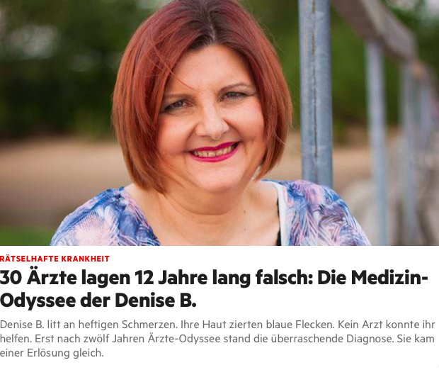 Das Titelbild des Artikels über Denise B., eine Frau die mit dem Ehlers-Danlos-Syndrom lebt. Denise trägt roten Lippenstift, eine blaue Bluse, hat rötliche Haare, die zu einem kinnlangen Bob geschnitten wurden und lächelt in die Kamera.