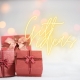 Three red gift boxes. Text: Gift Ideas