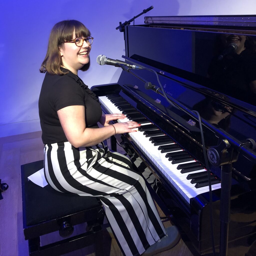 A photo of me playing the beautiful piano at King's Place